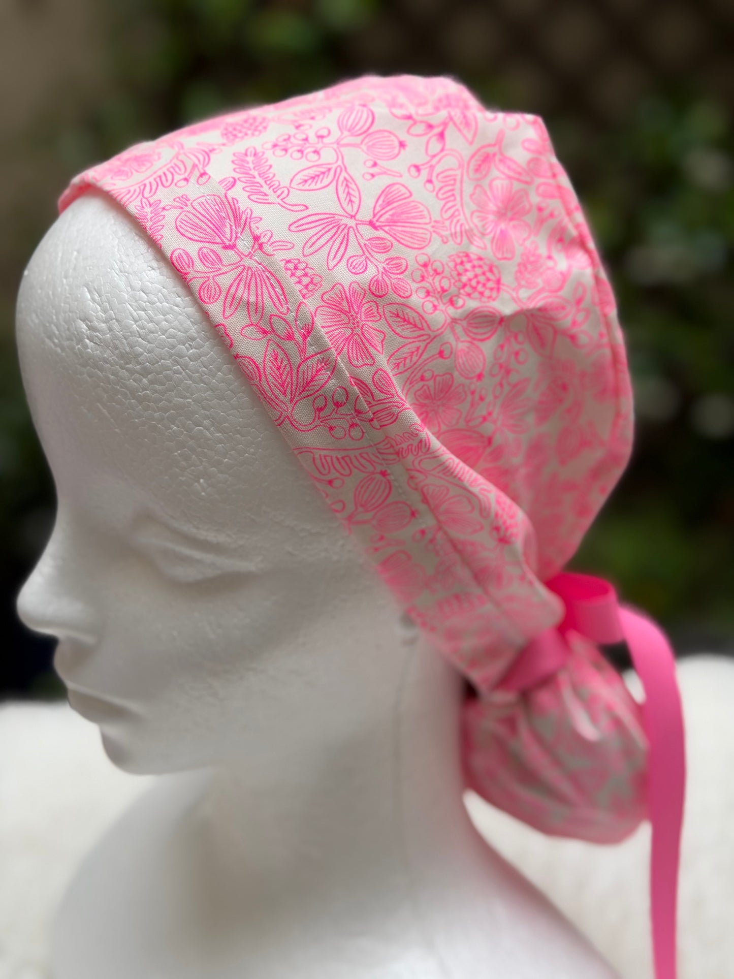 Neon pink ponytail scrub cap