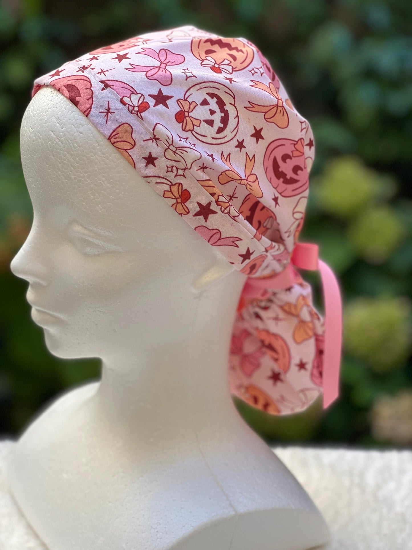 Pink pumpkin with bow scrub cap