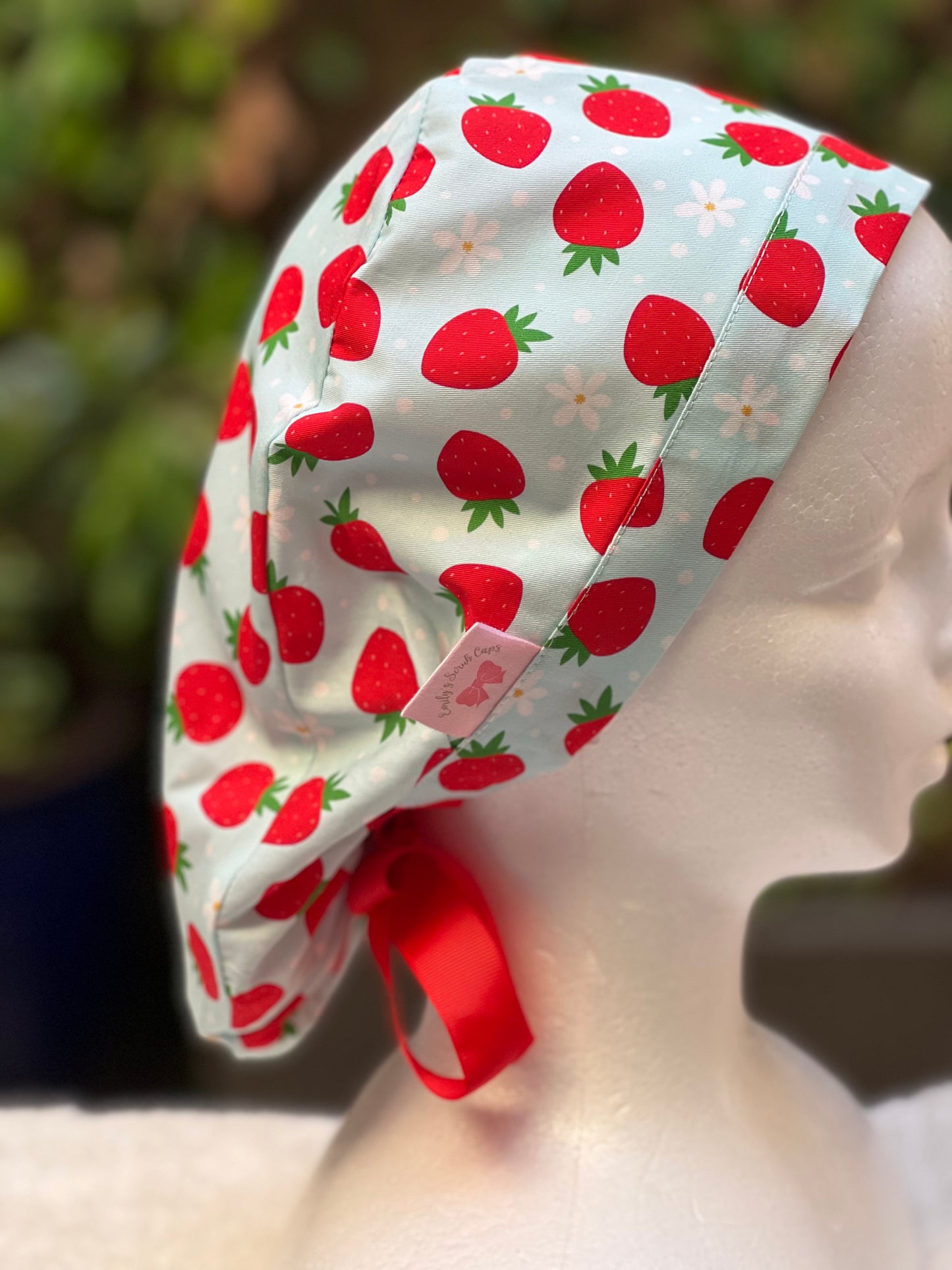 Green strawberry with daisies ponytail scrub cap
