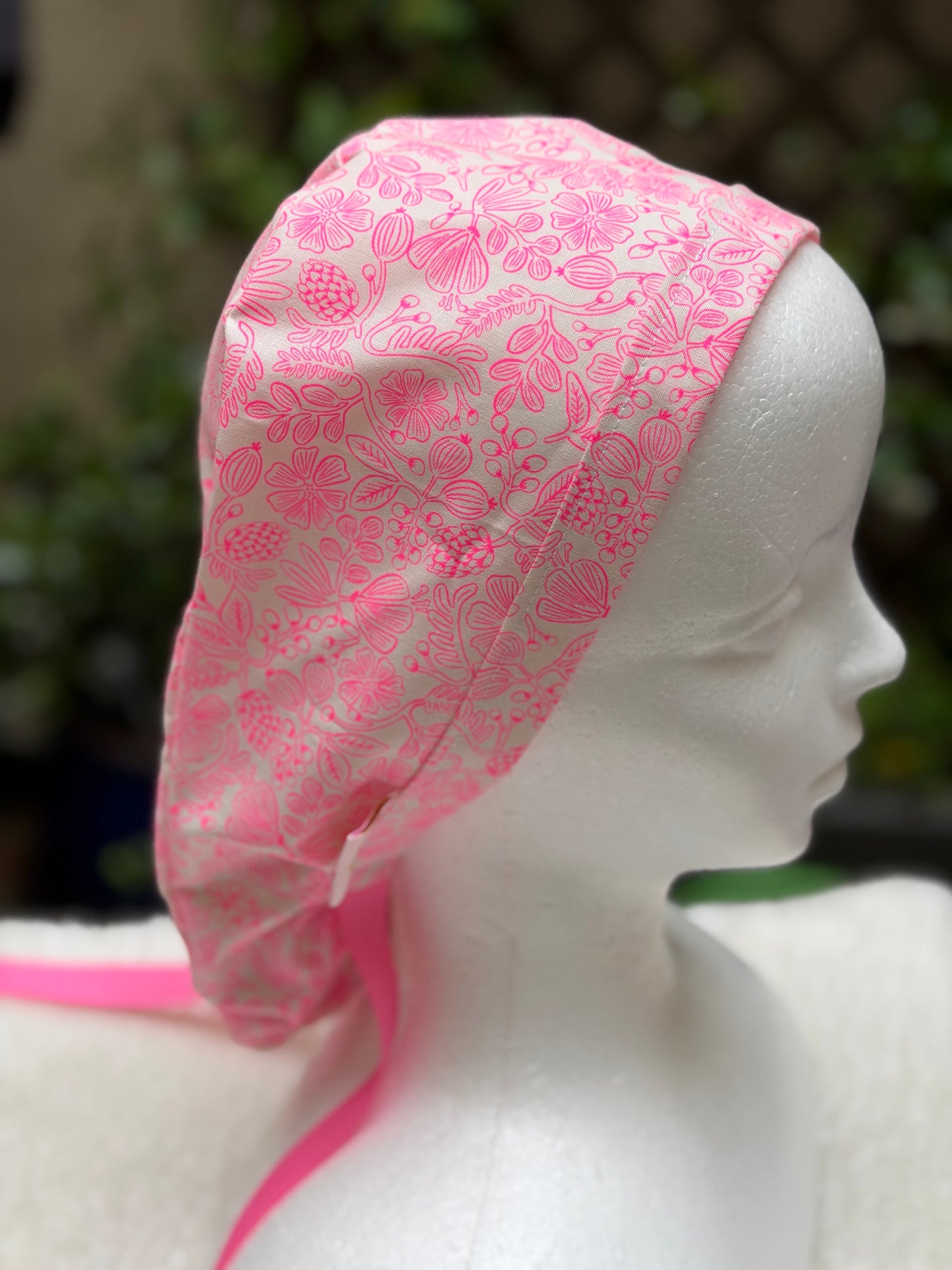 Neon pink ponytail scrub cap