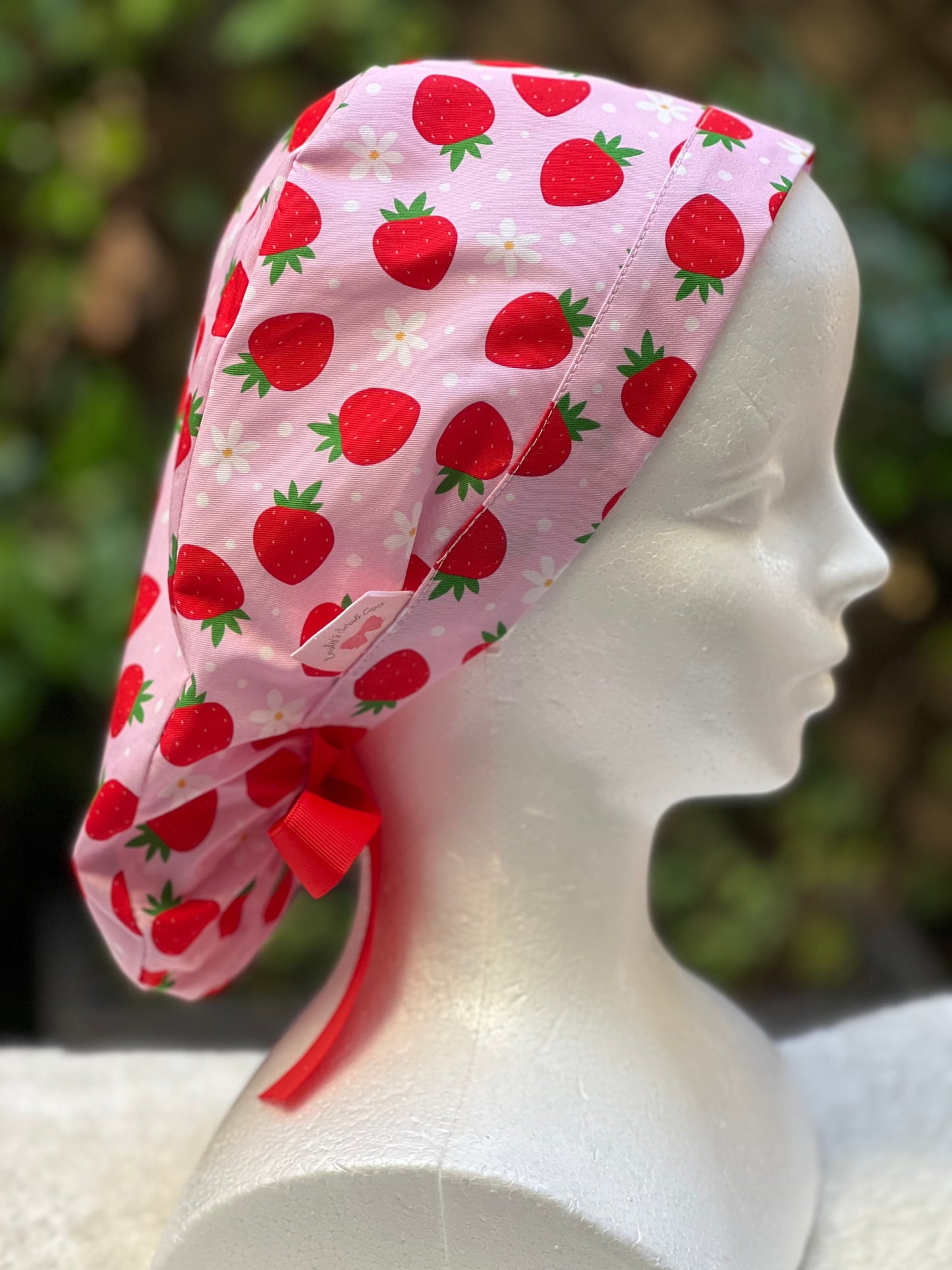 Pink strawberry with daisies ponytail scrub cap