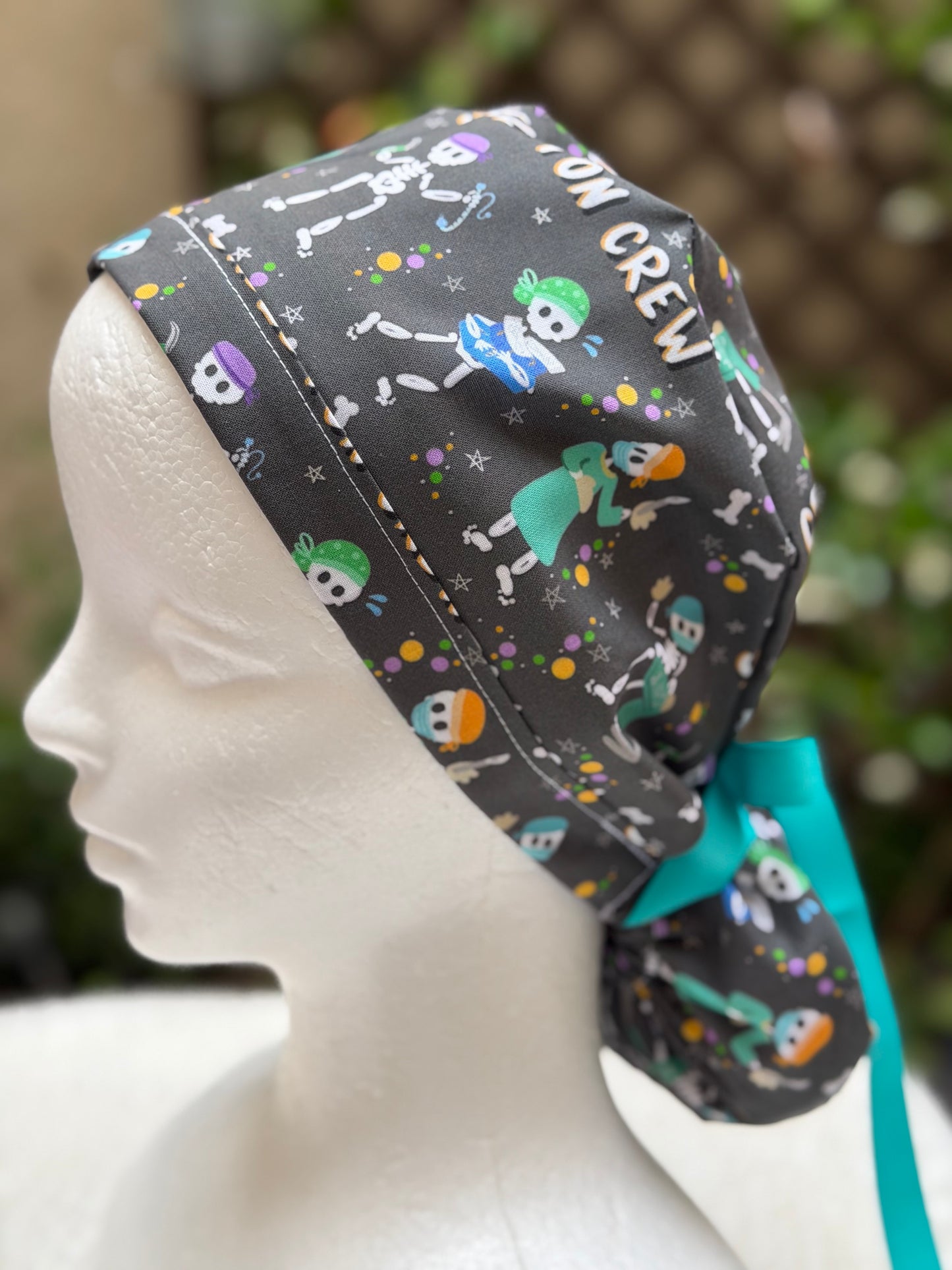 The Skeleton Crew Ponytail Scrub Cap