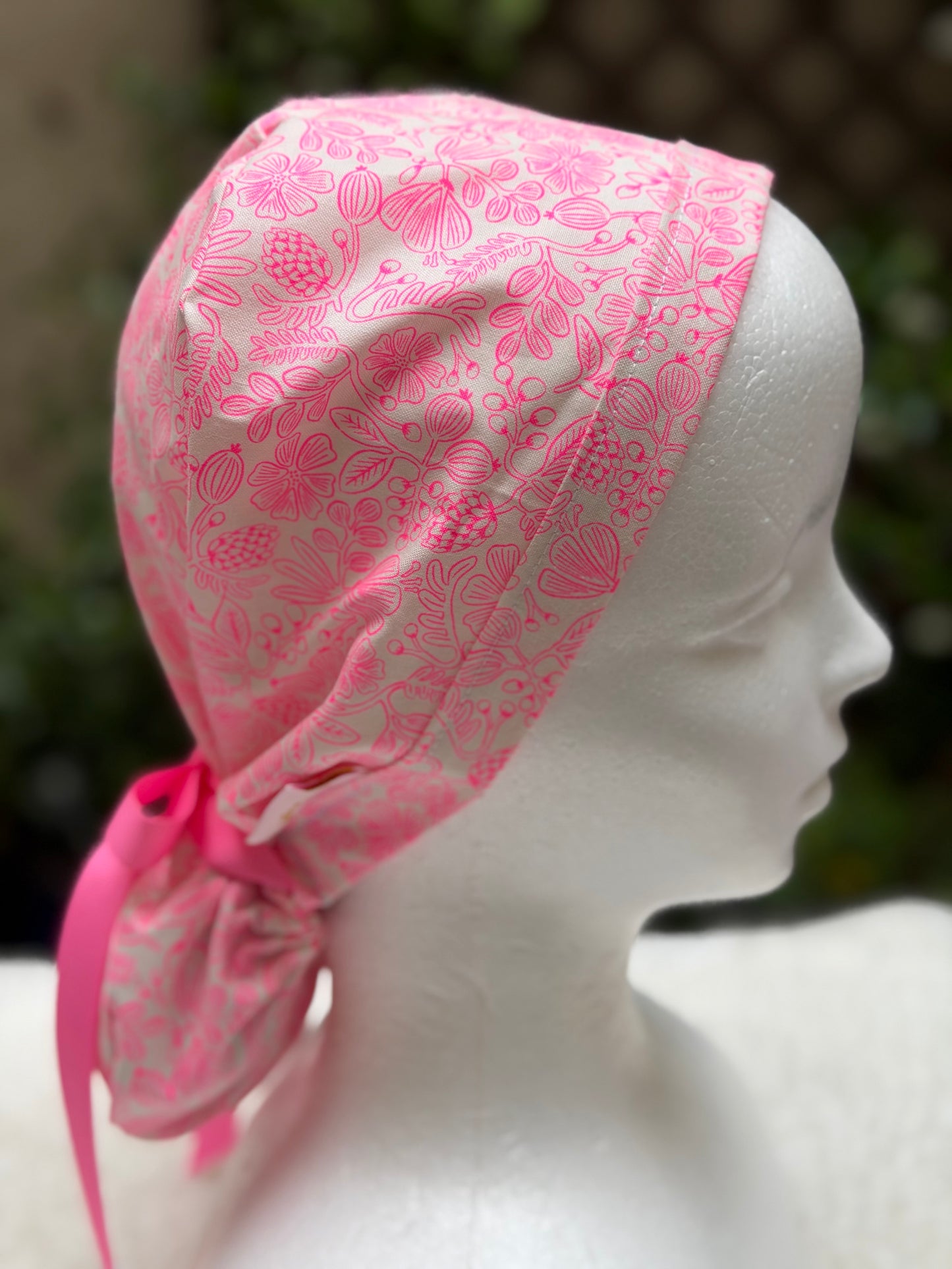 Neon pink ponytail scrub cap
