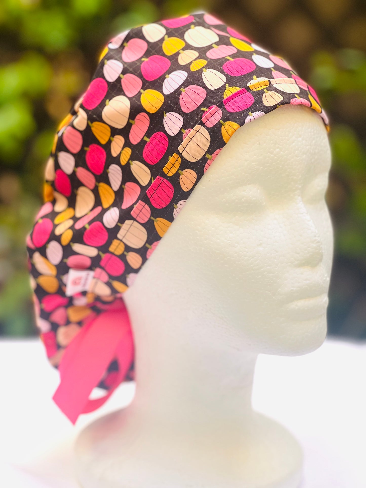 Pink pumpkin in black  Ponytail scrub cap