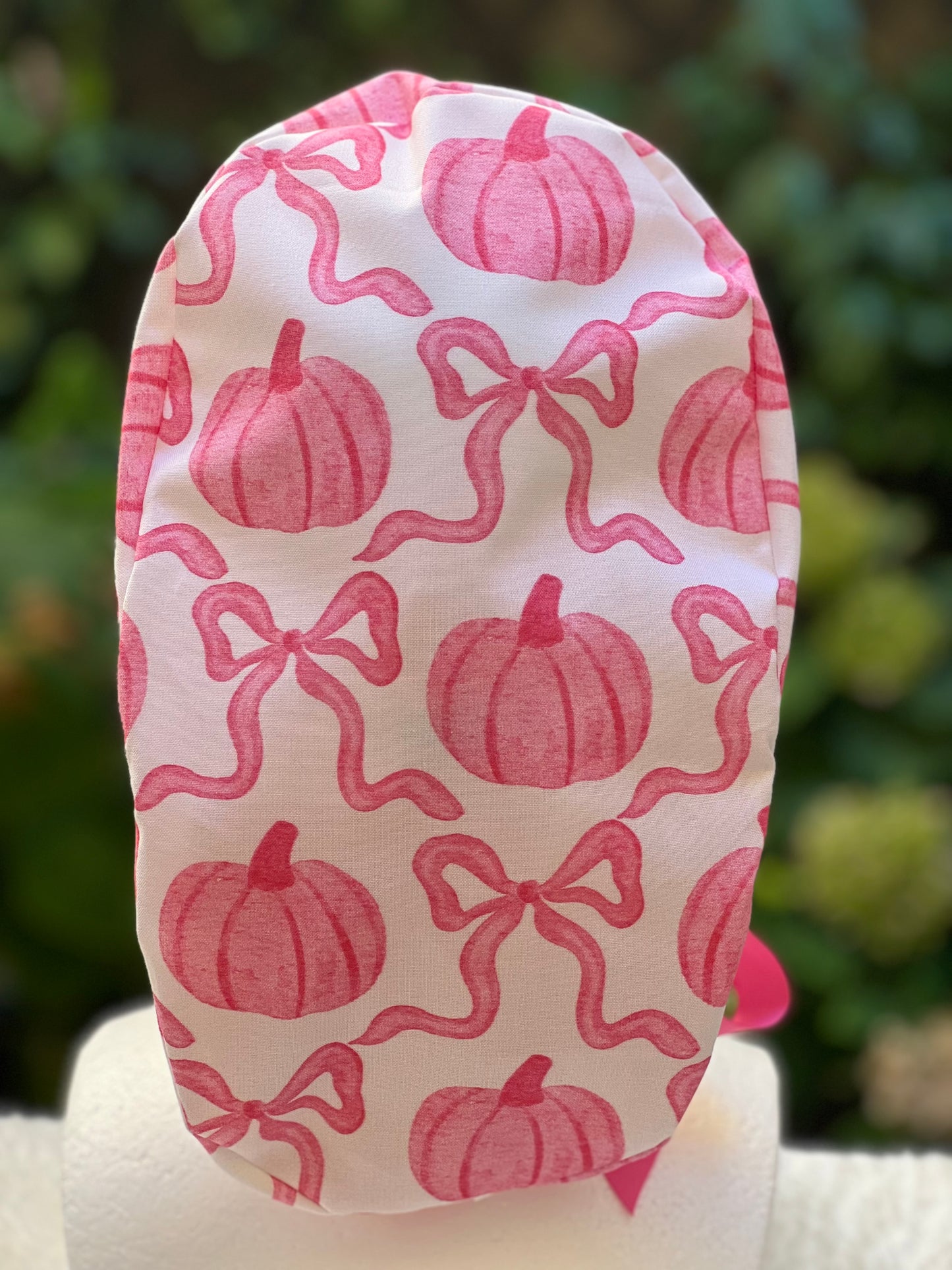 Pink pumpkin with bow scrub cap