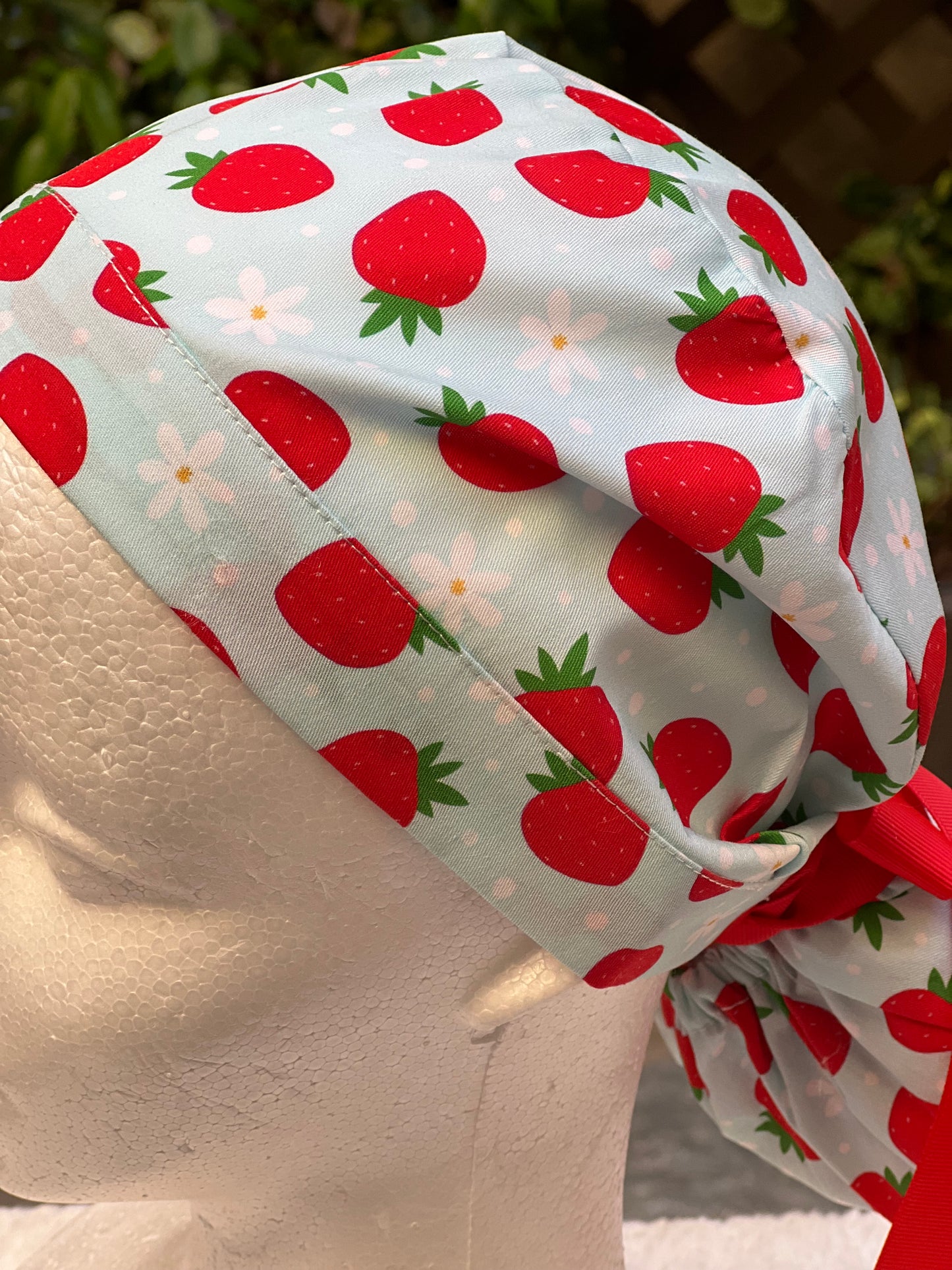 Green strawberry with daisies ponytail scrub cap