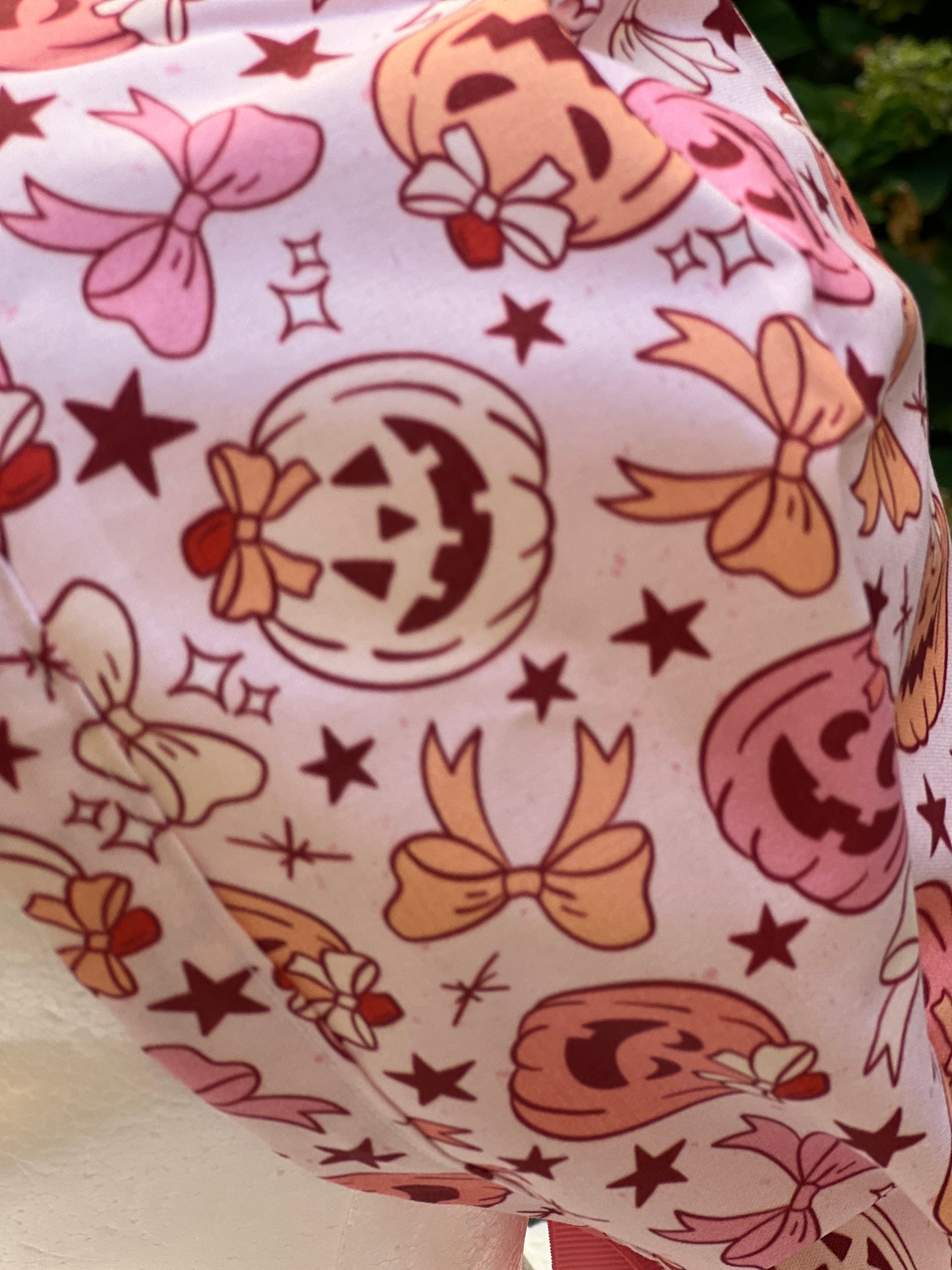 Pink pumpkin with bow scrub cap