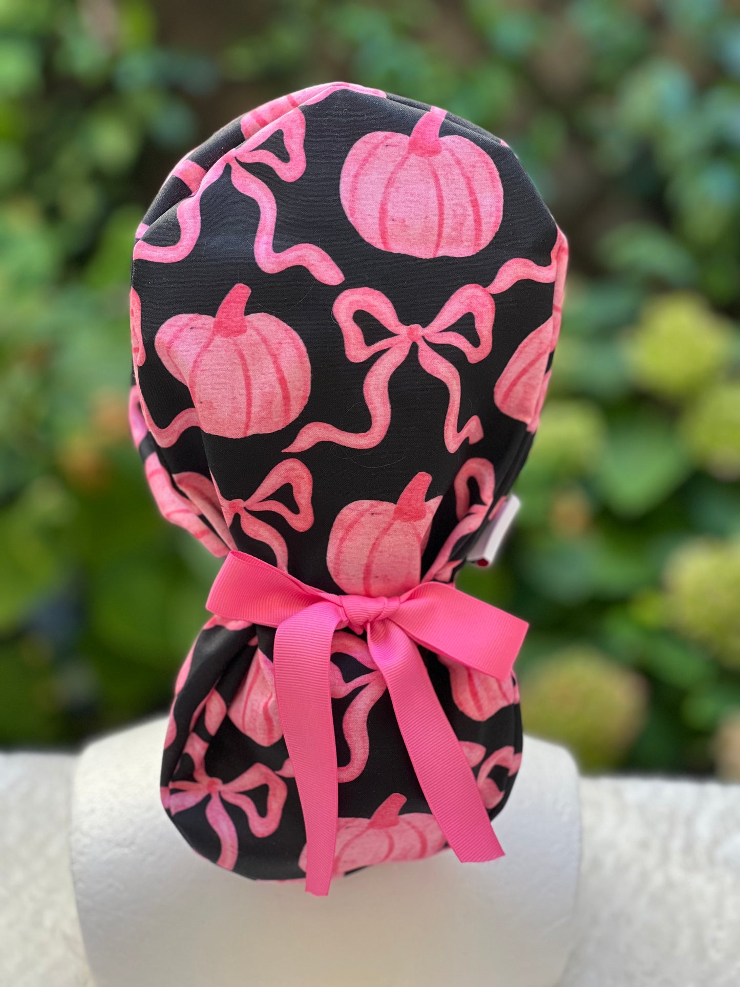 Black and Pink pumpkin with bow scrub cap