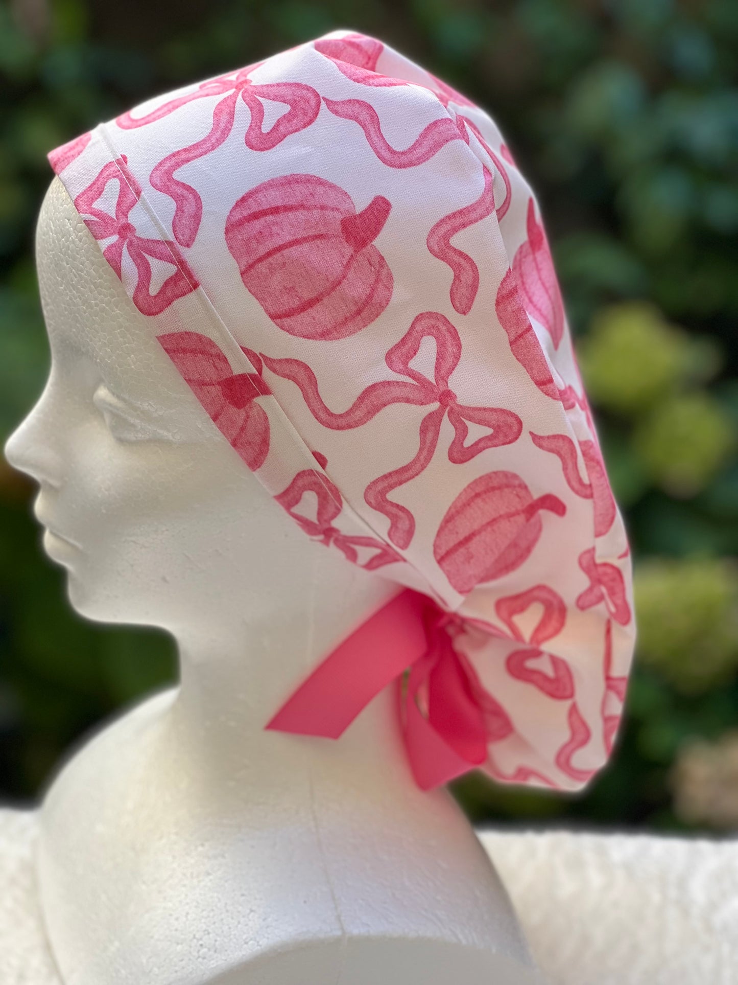 Pink pumpkin with bow scrub cap
