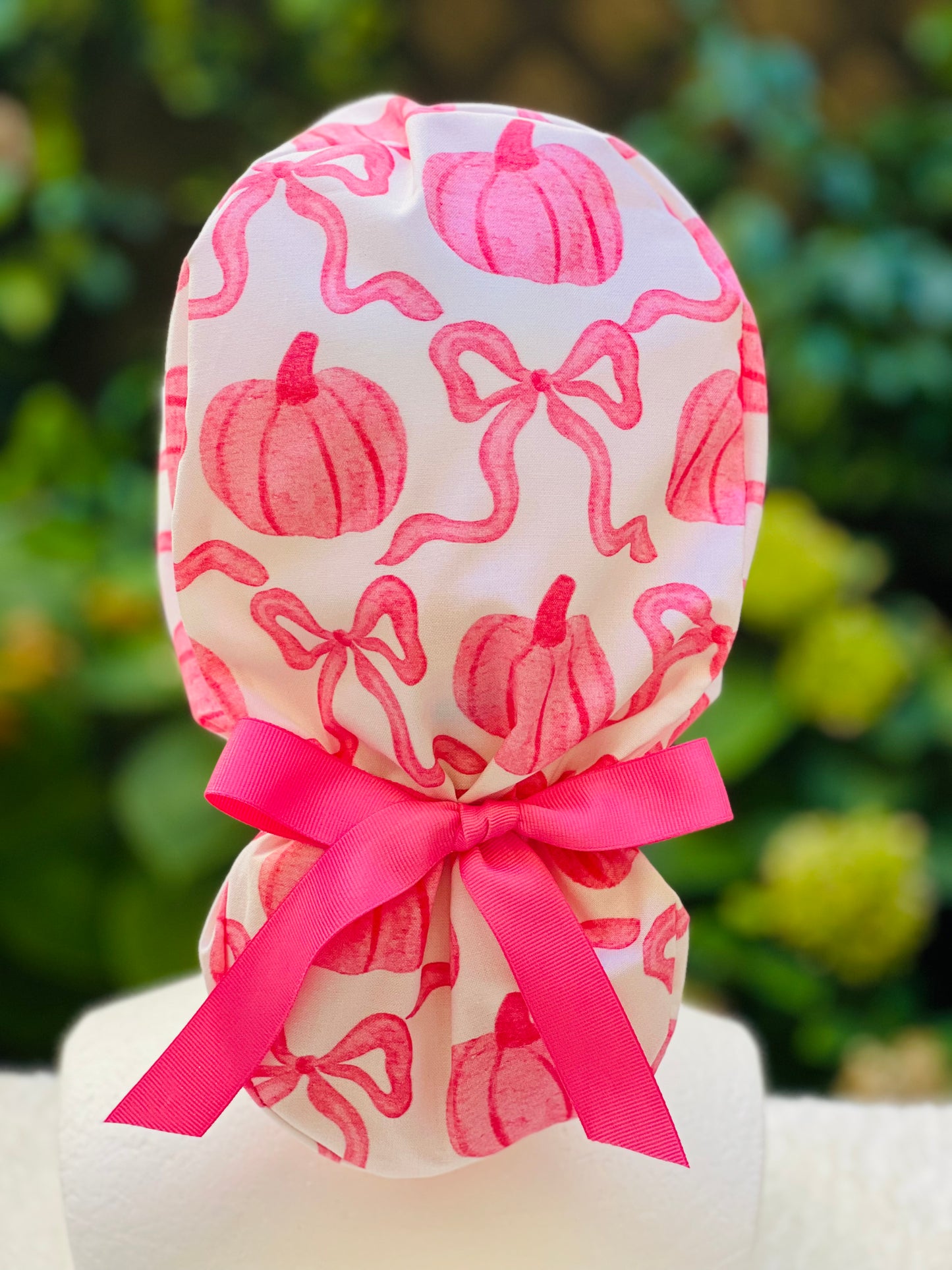 Pink pumpkin with bow scrub cap
