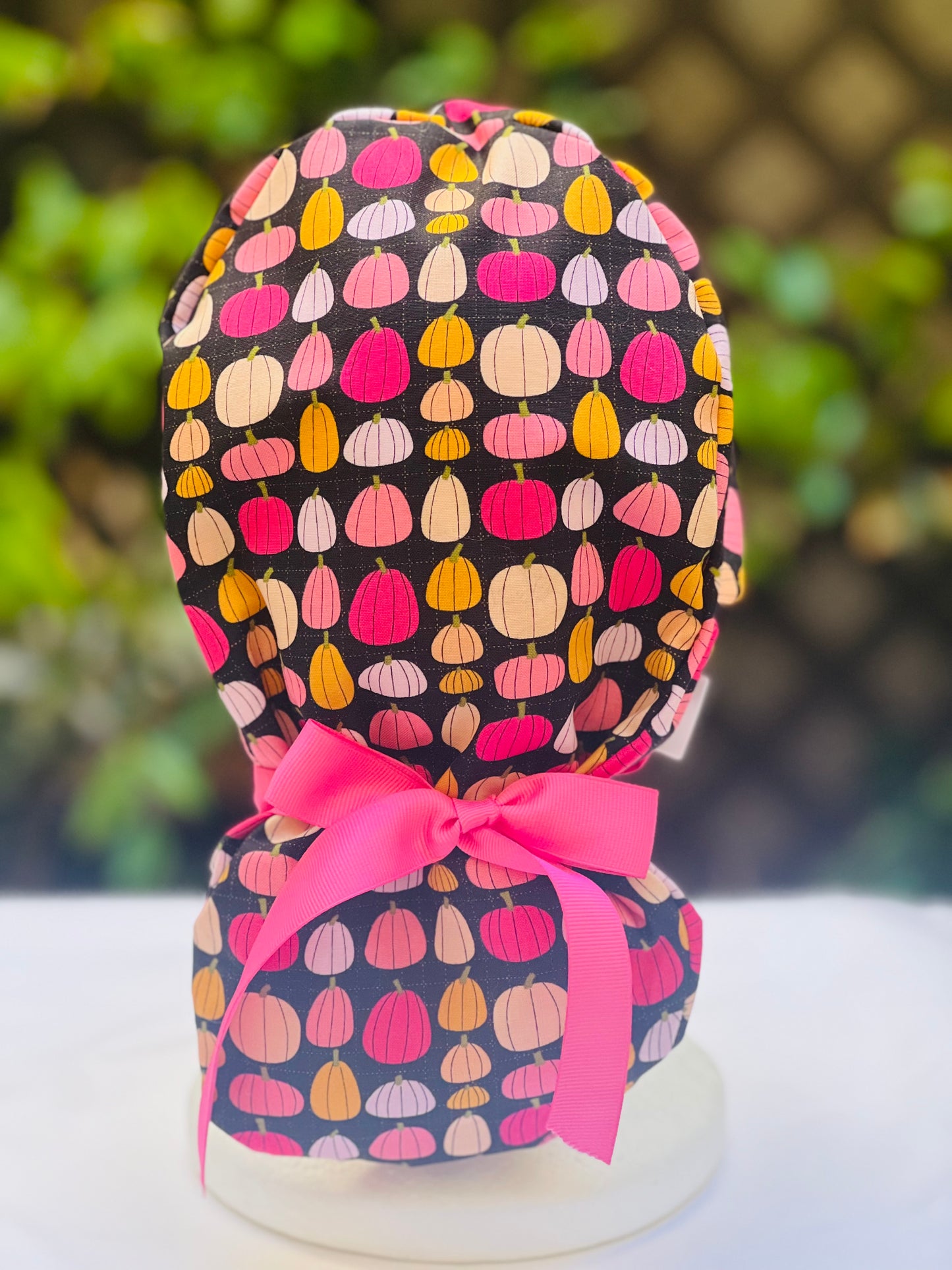 Pink pumpkin in black  Ponytail scrub cap