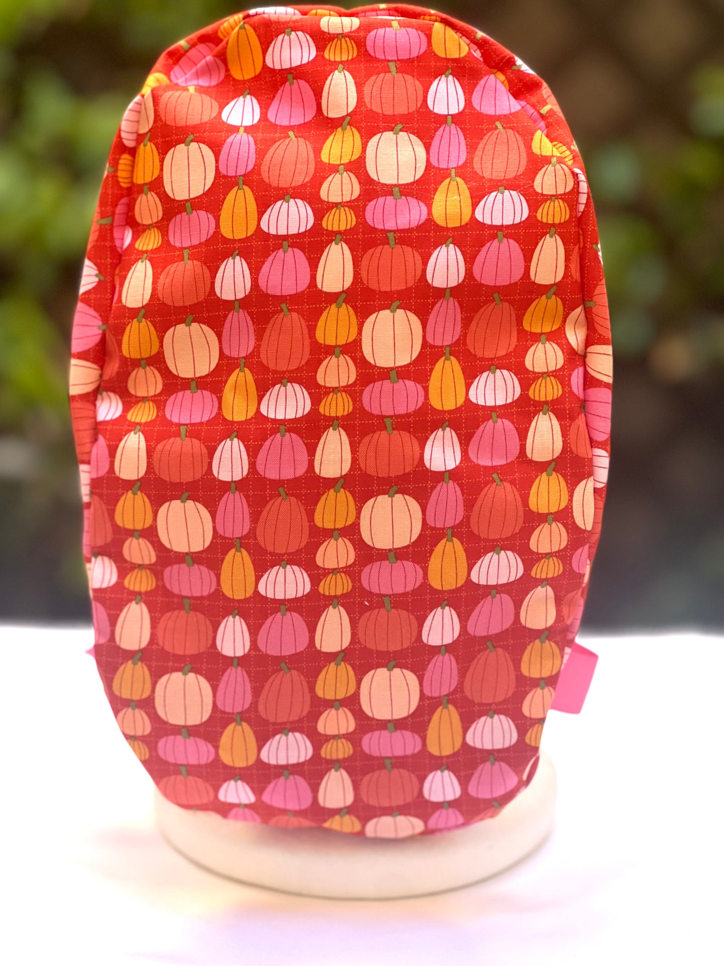 Pink pumpkin in orange Ponytail scrub cap