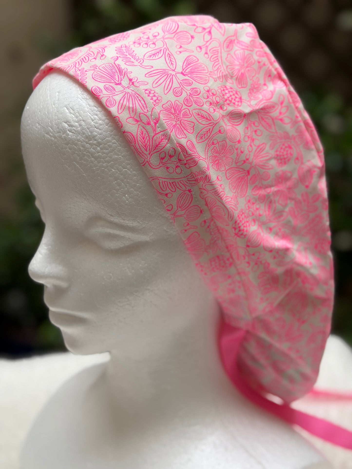 Neon pink ponytail scrub cap