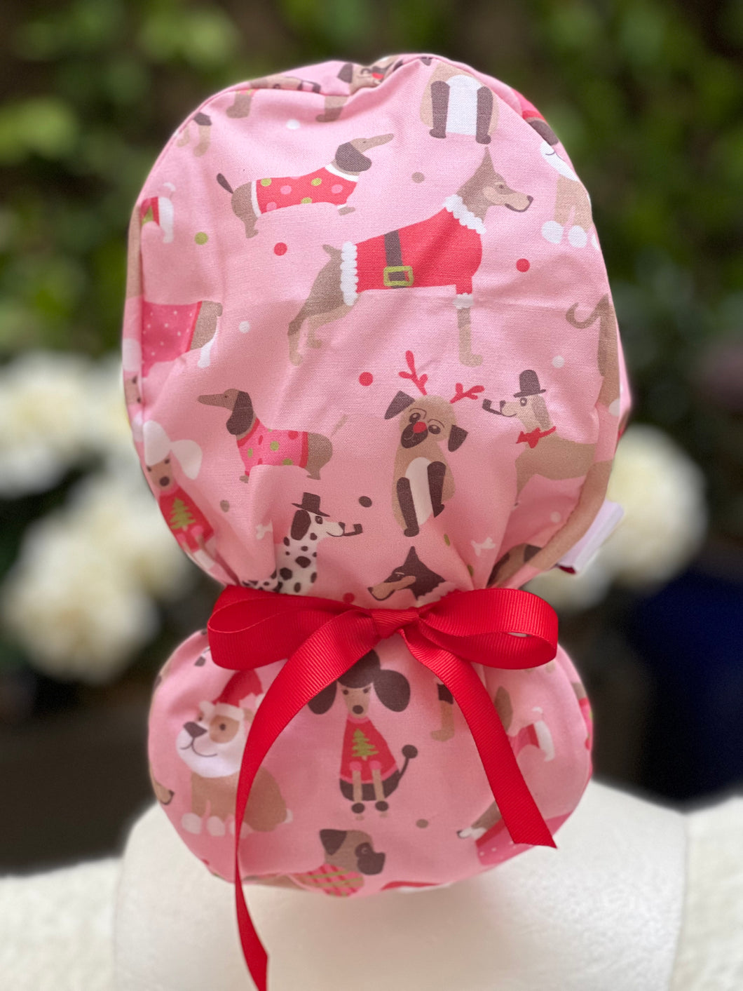 Pink dog Christmas bow scrub cap