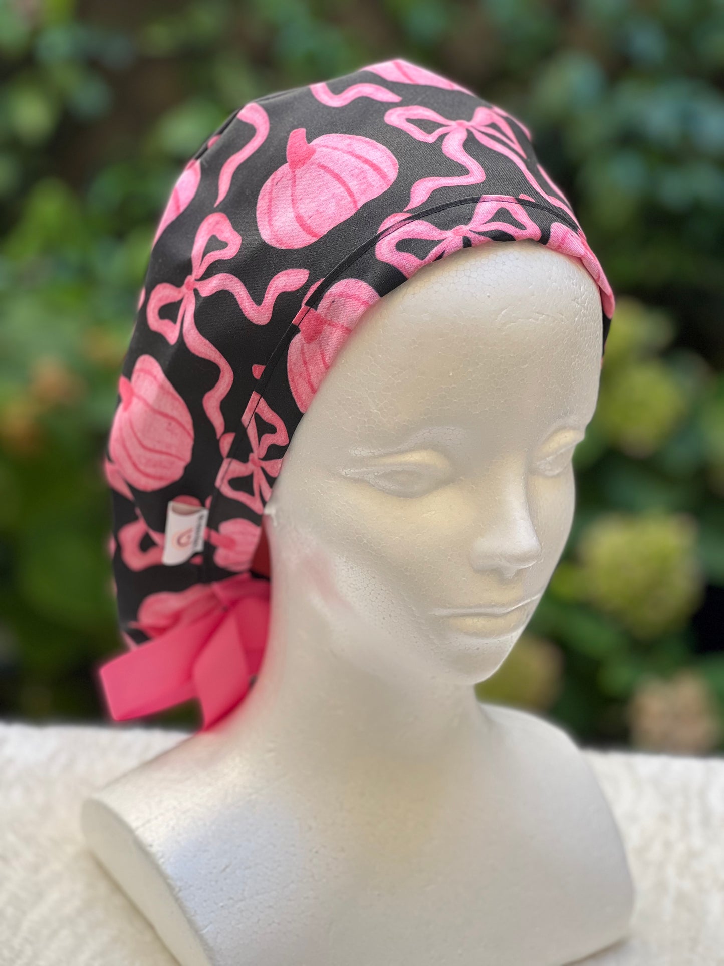 Black and Pink pumpkin with bow scrub cap