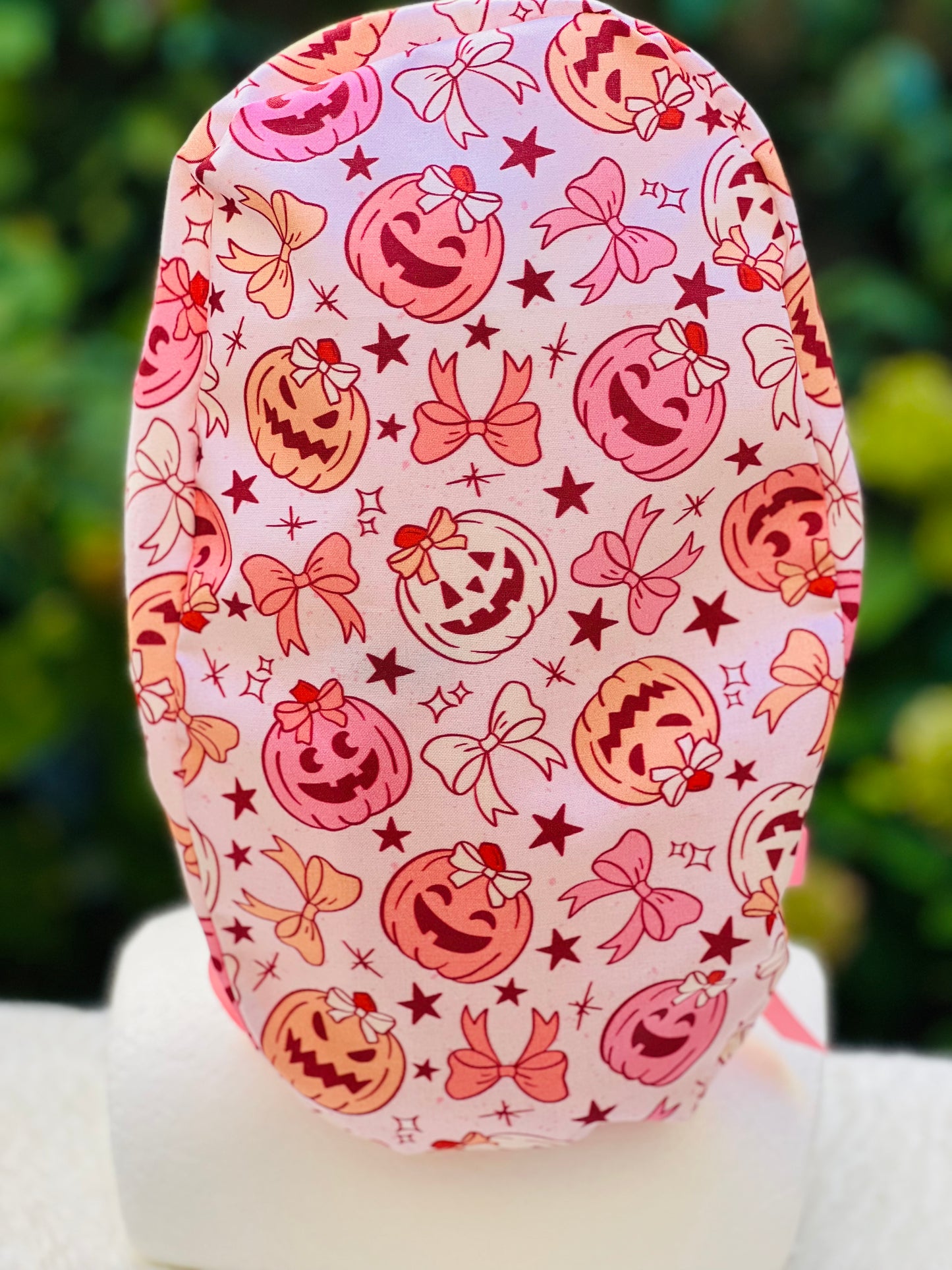 Pink pumpkin with bow scrub cap