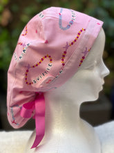Load image into Gallery viewer, Pink Friendship Bracelet Ponytail Scrub Cap
