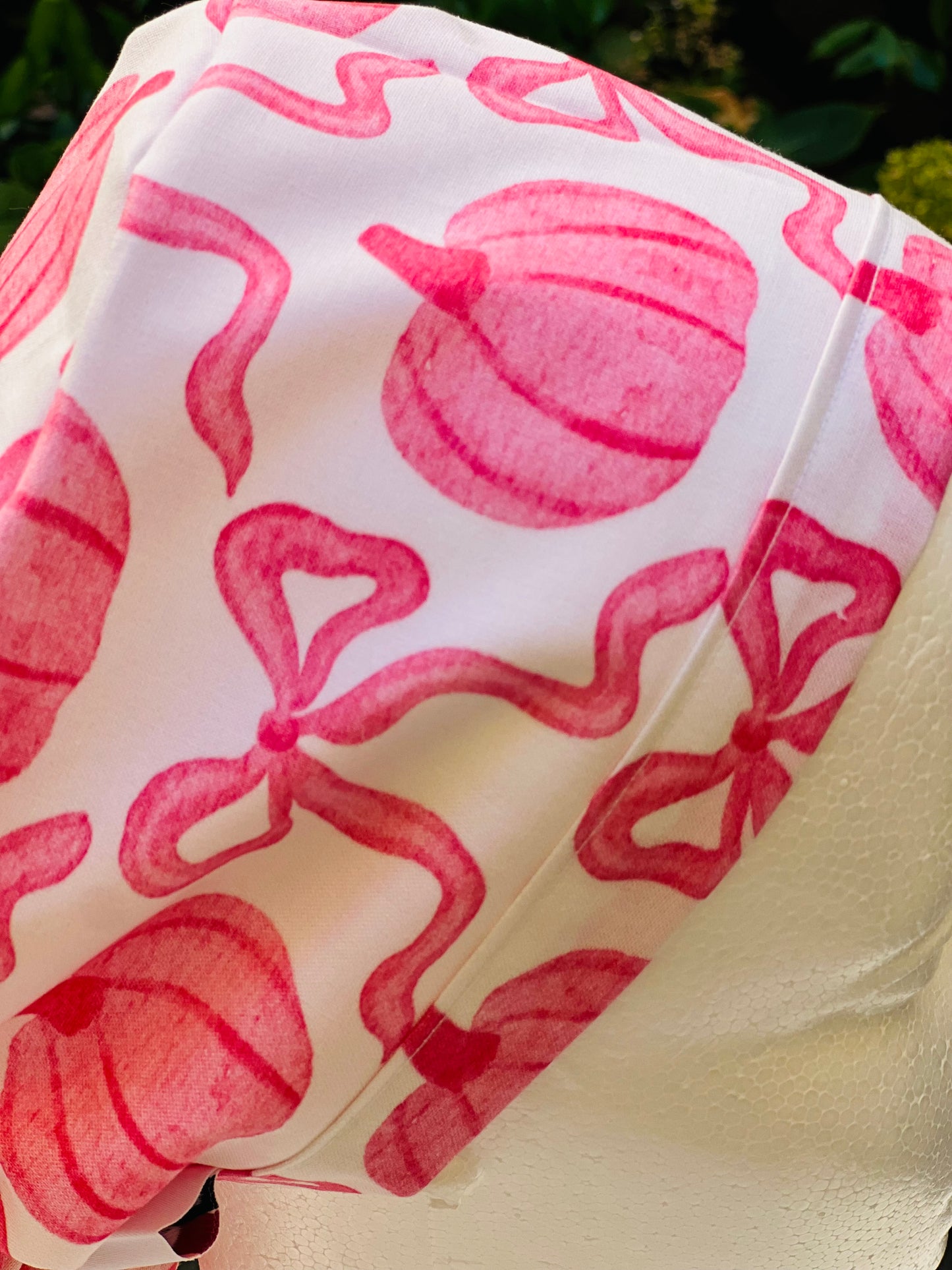 Pink pumpkin with bow scrub cap
