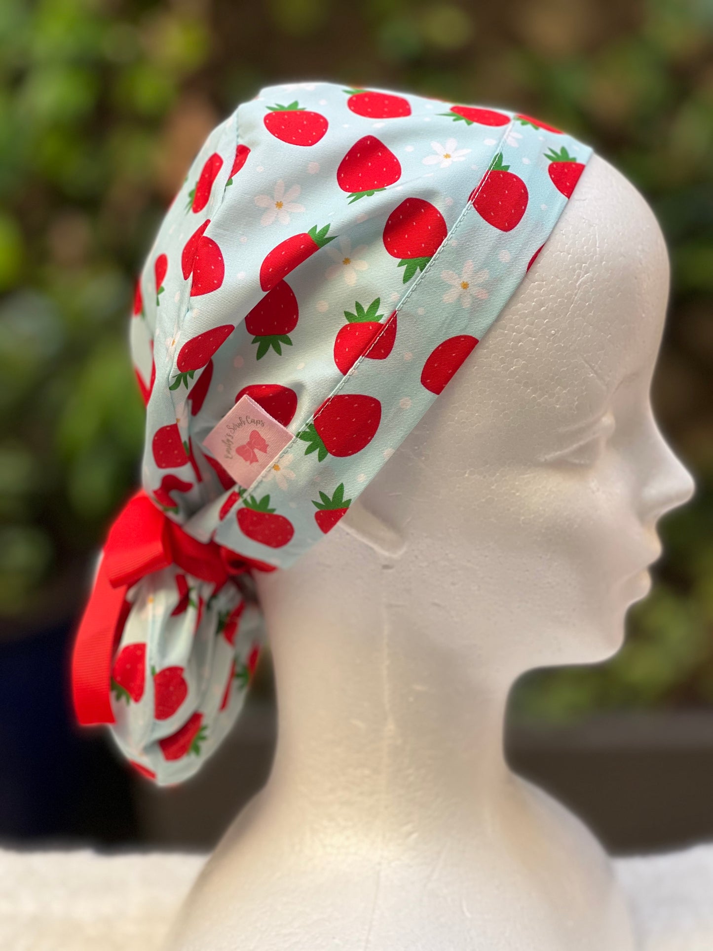 Green strawberry with daisies ponytail scrub cap