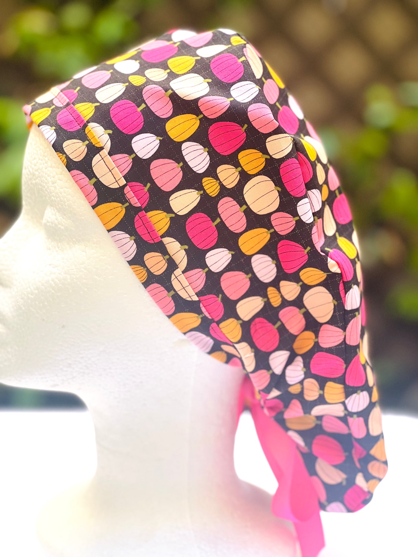 Pink pumpkin in black  Ponytail scrub cap