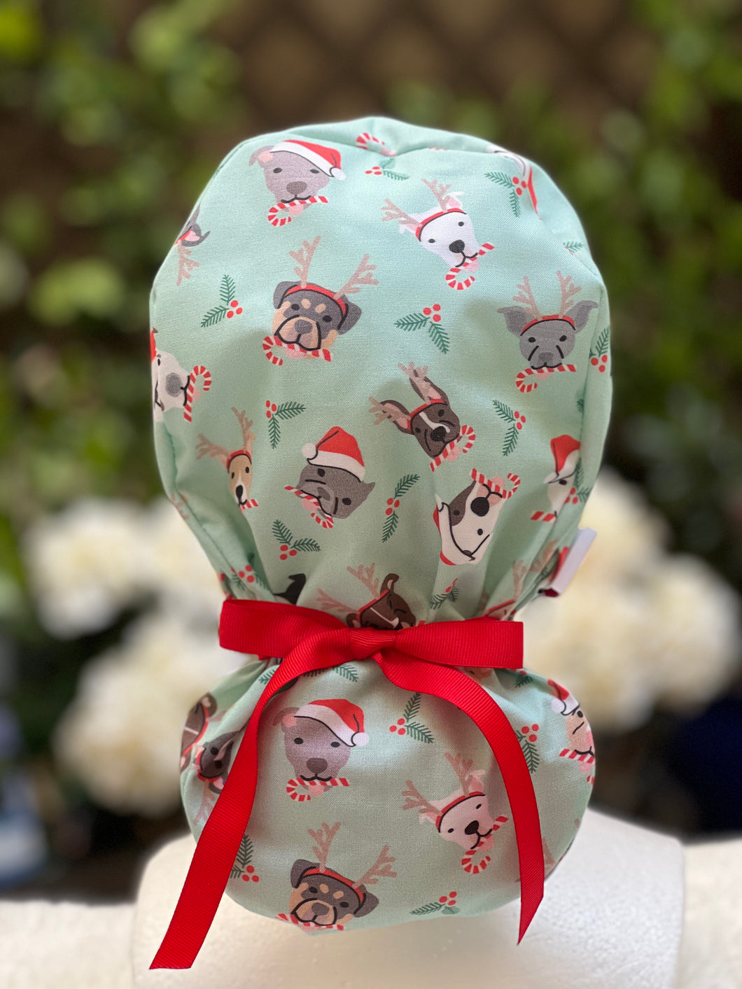 Green puppy Christmas bow scrub cap