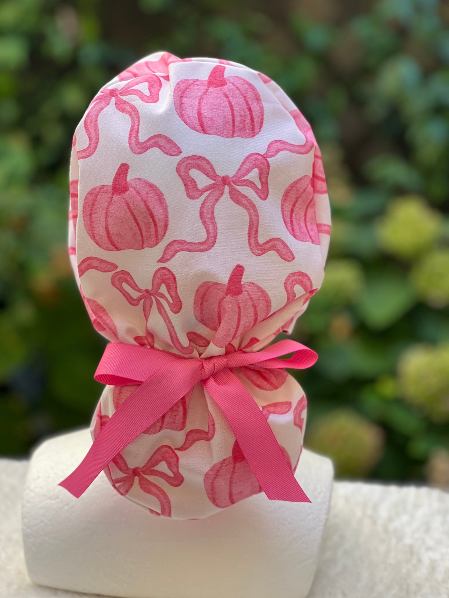 Pink pumpkin with bow scrub cap