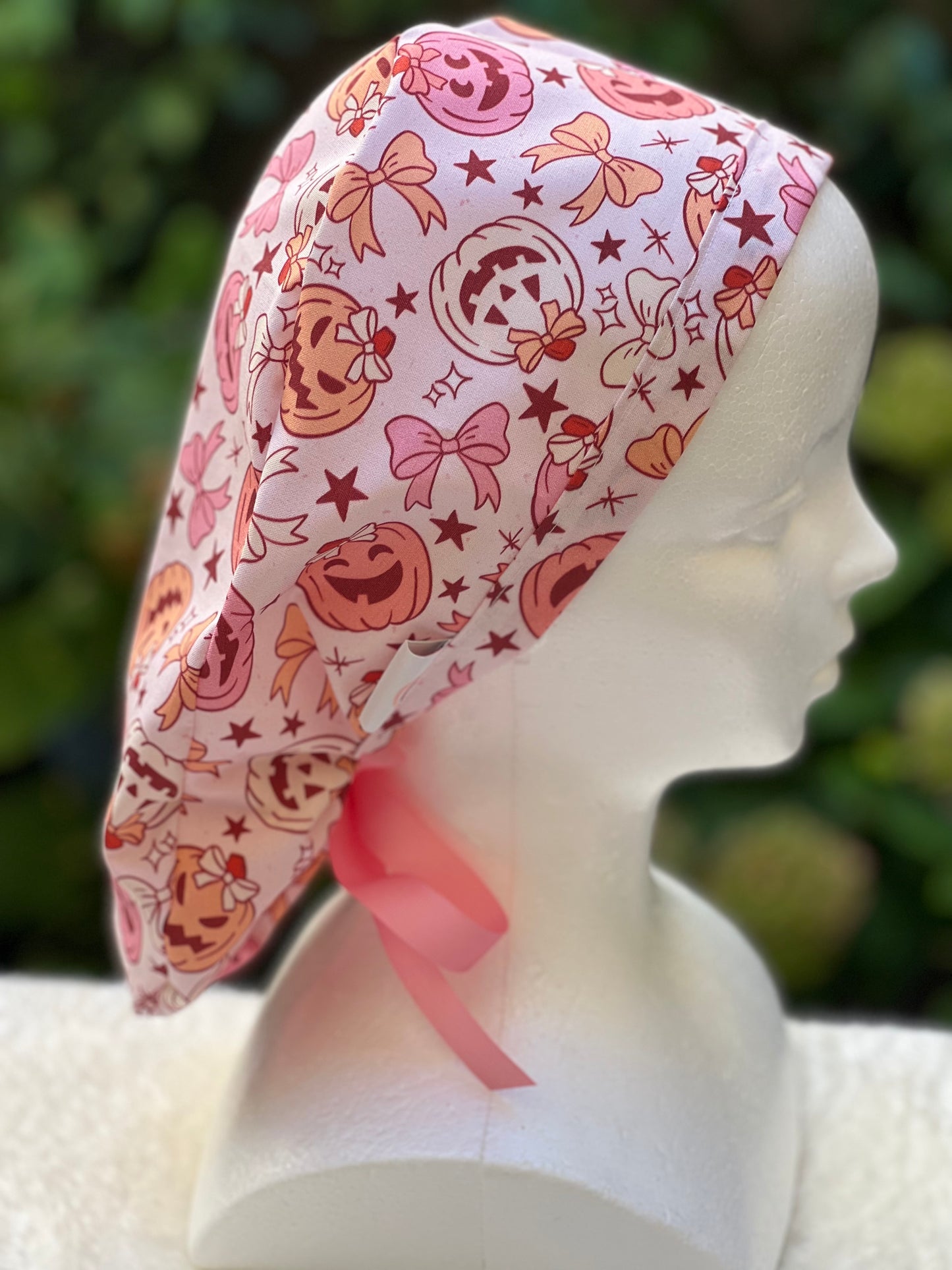 Pink pumpkin with bow scrub cap
