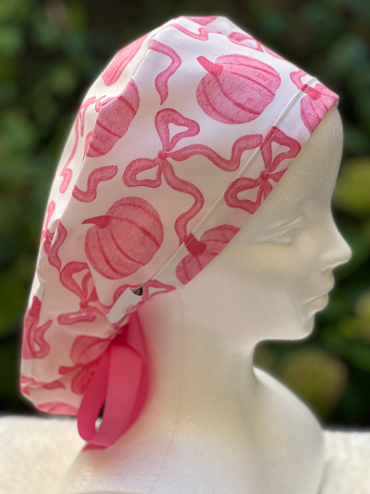 Pink pumpkin with bow scrub cap