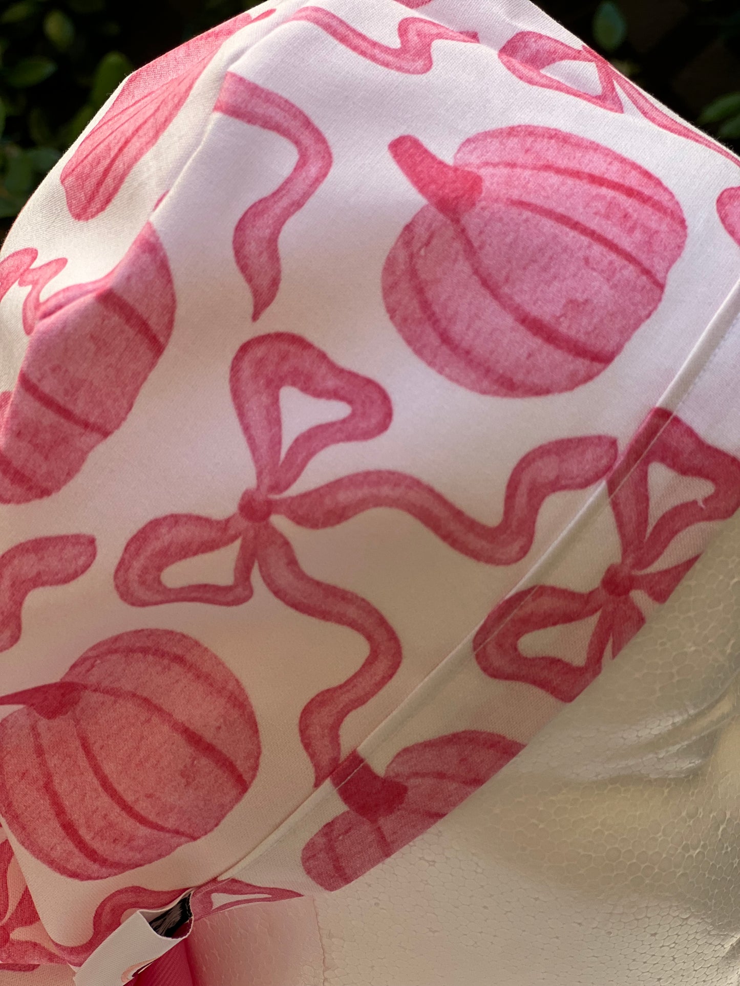 Pink pumpkin with bow scrub cap