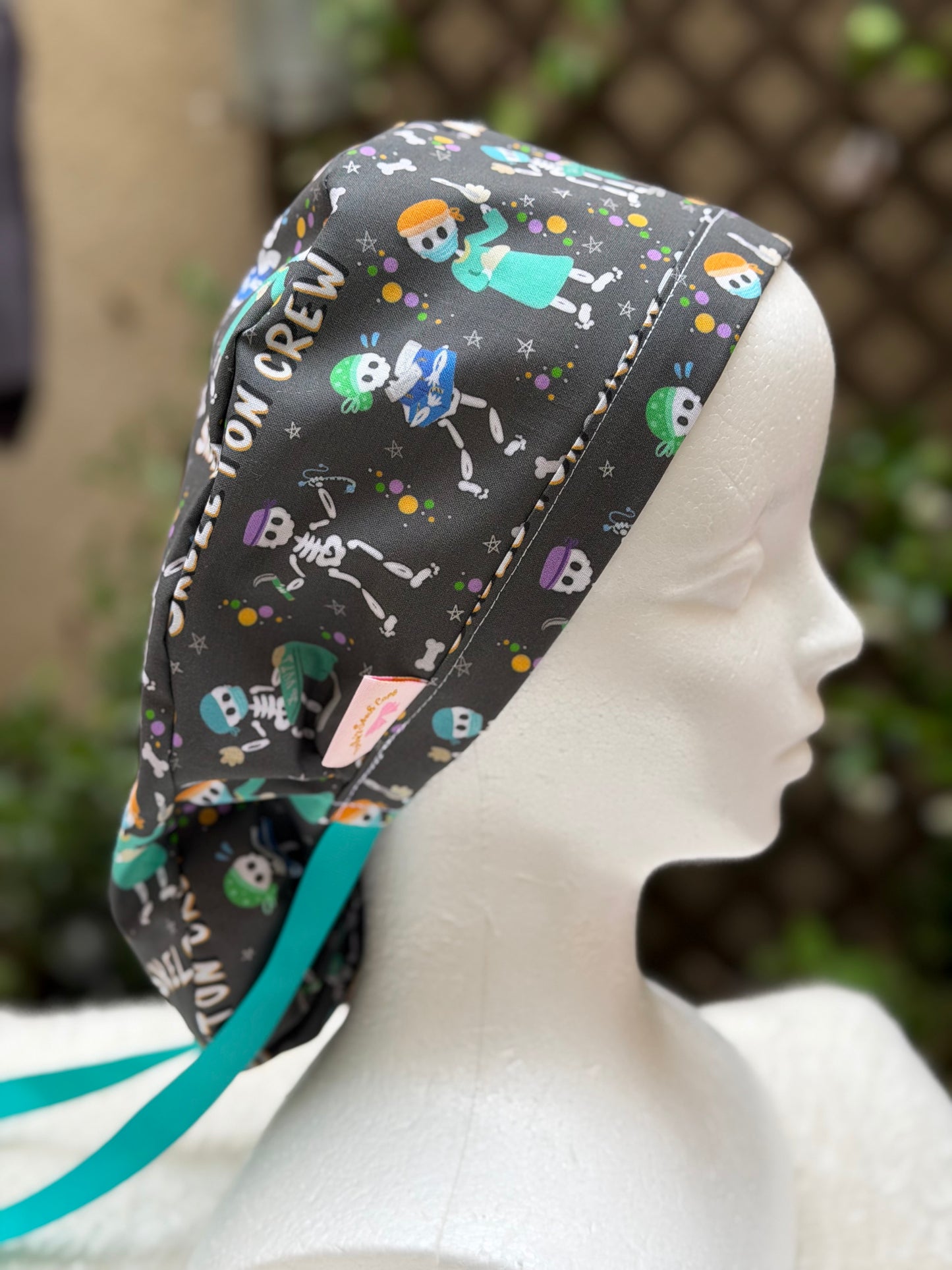 The Skeleton Crew Ponytail Scrub Cap