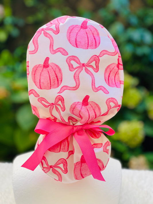 Pink pumpkin with bow scrub cap